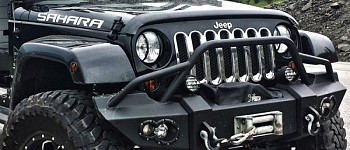 Photo of a Fab Fours Lifestyle Front Winch Bumper With Grill Guard And 1