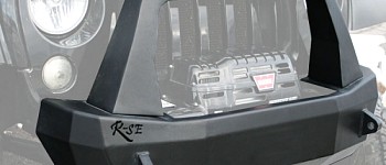 Photo of a Rock Slide Rigid Shorty Front Bumper With Bull Bar, Winch Opening & Integrated Winch Plate